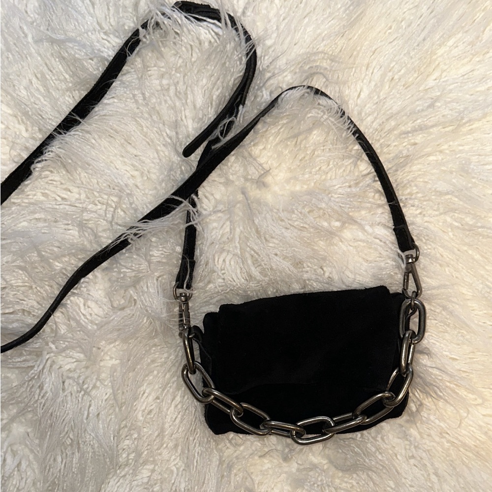 Free people mini black purse with long strap and chain in front